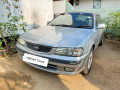 nissan-fb15-silver-auto-for-rent-small-2