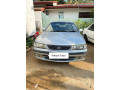 nissan-fb15-silver-auto-for-rent-small-0